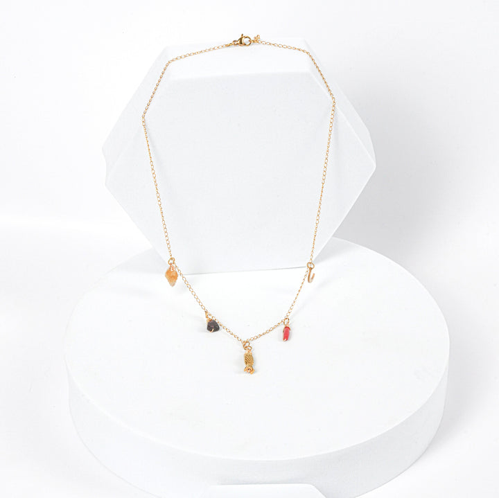 NAM009 Collana in acciaio chirurgico dorato con pendenti e cristalli naturali