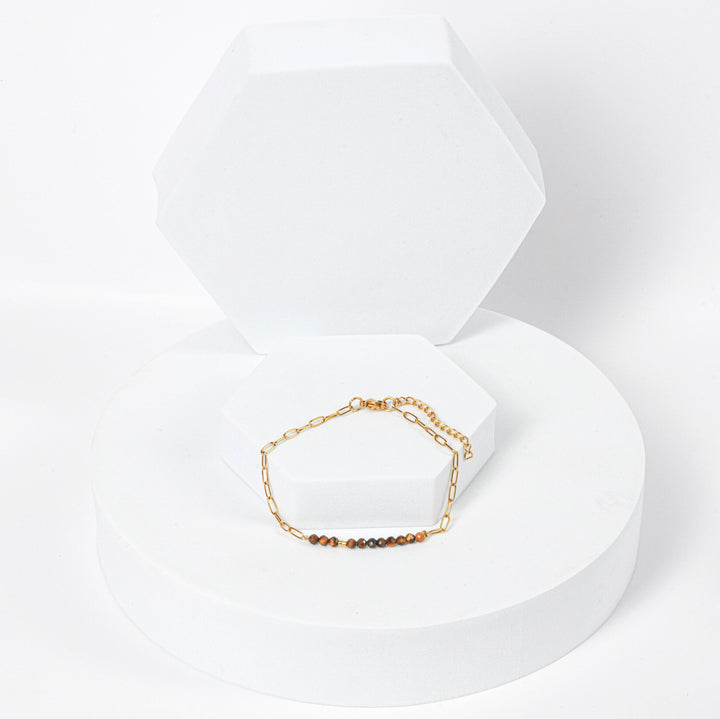 NAM014 Bracciale in acciaio chirurgico dorato e occhio di tigre