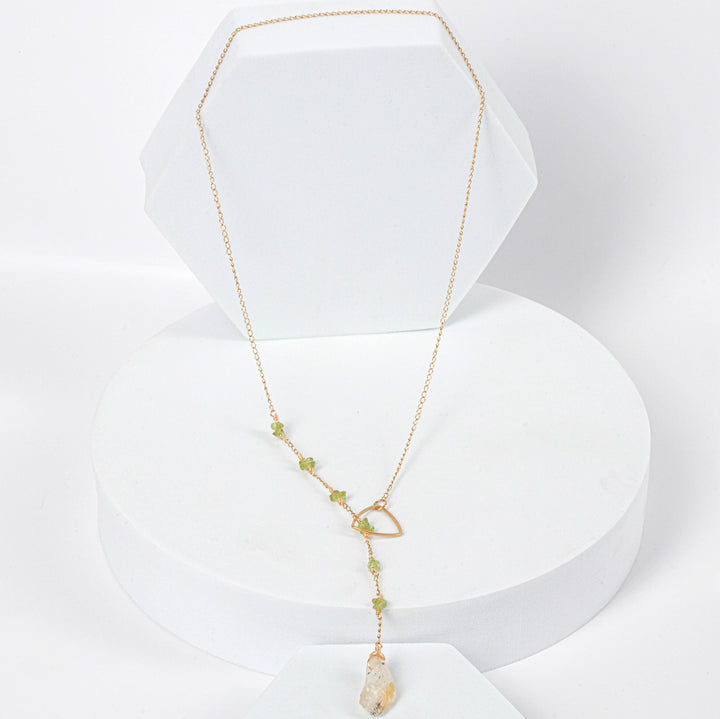 NAM022 Collana in acciaio chirurgico dorato con peridoto e citrino