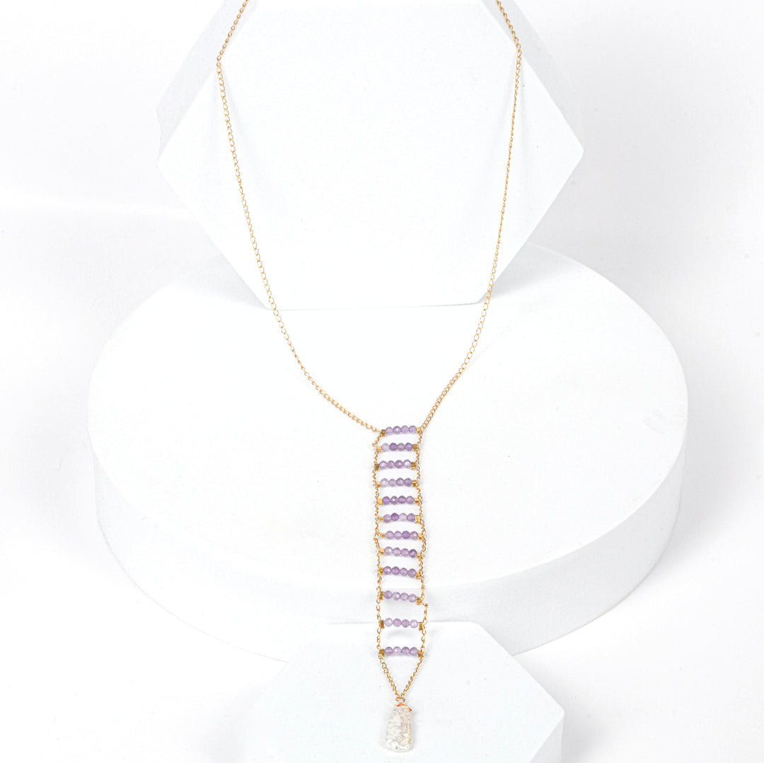 NAM012 Collana in acciaio chirurgico dorato ametista e perla