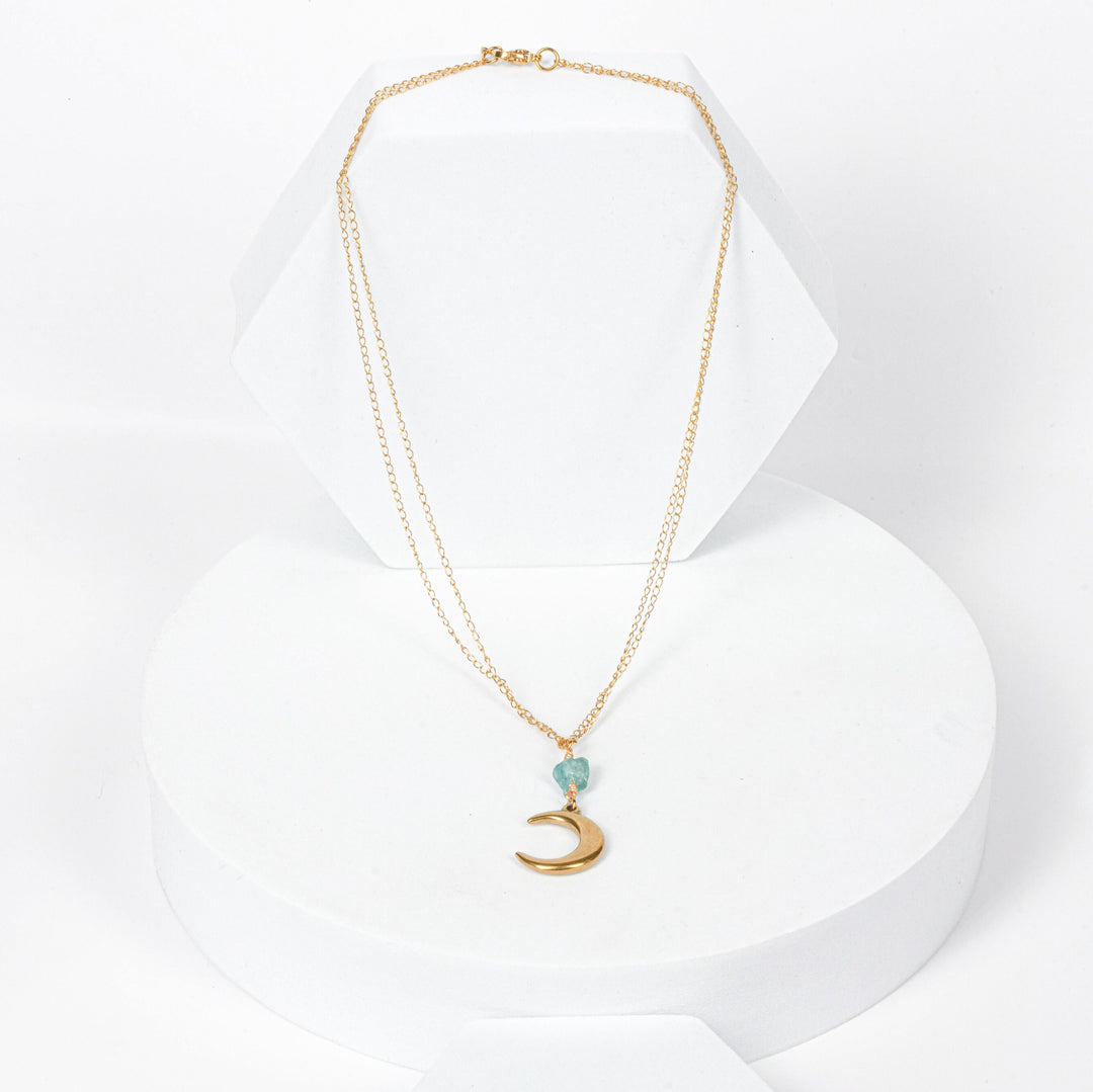 NAM013 Collana in acciaio chirurgico dorato con pendente luna e acqua marina