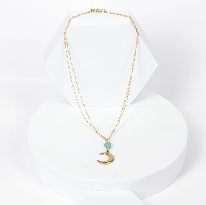 NAM013 Collana in acciaio chirurgico dorato con pendente luna e acqua marina