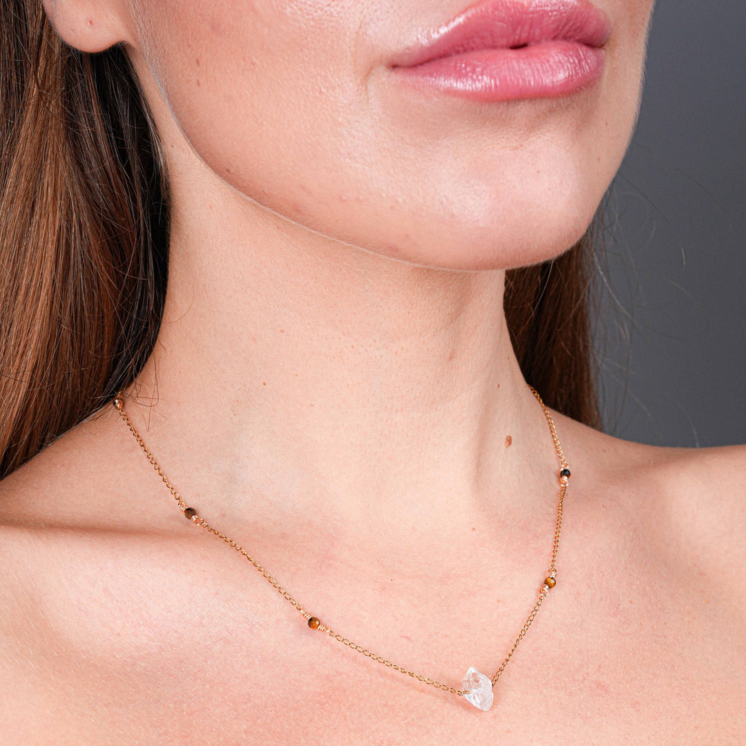 NAM011 Collana in acciaio chirurgico dorato occhio di tigre e quarzo